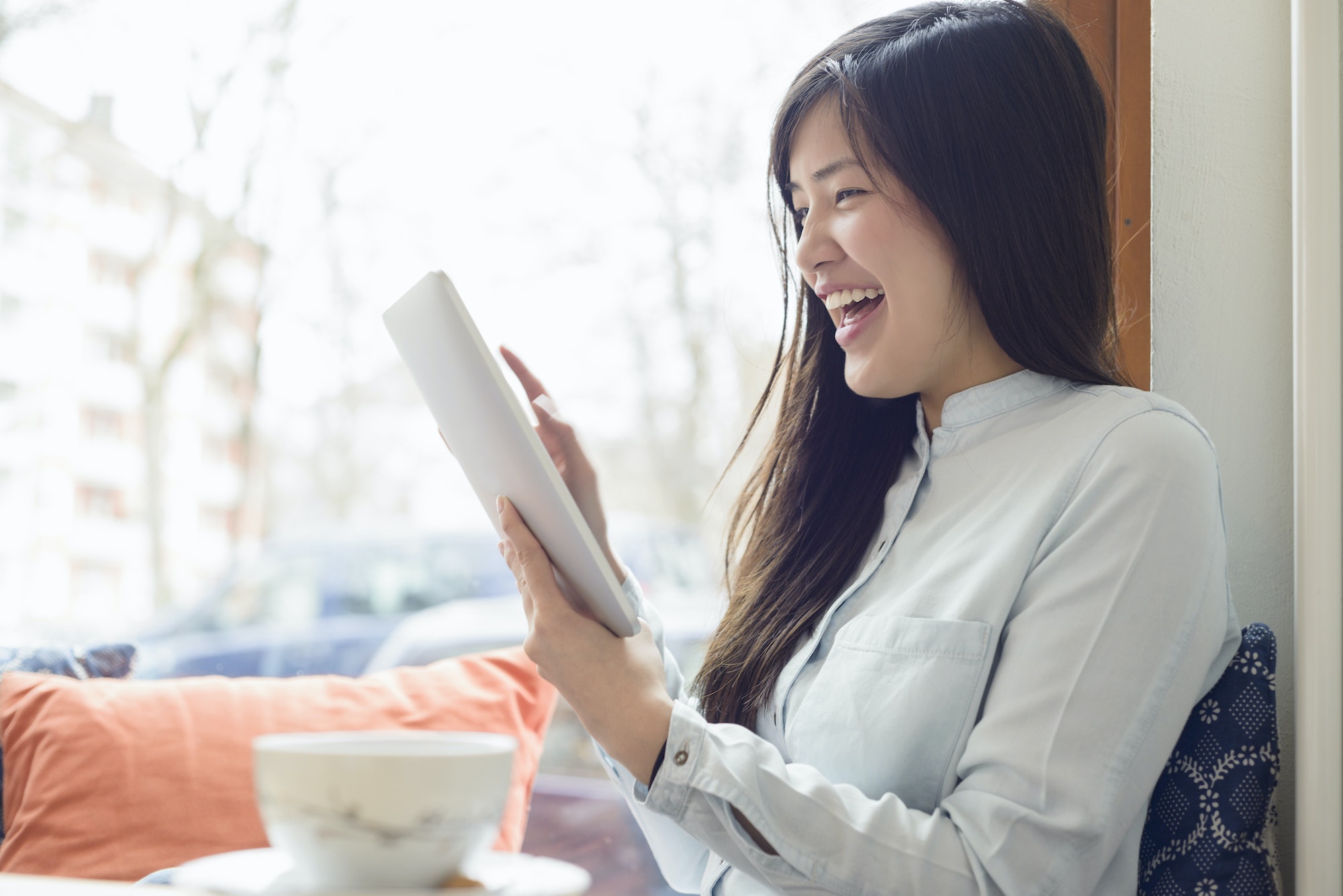 Woman using digital tablet